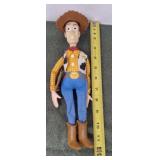 Toy story, Woody doll, copyright Disney, Pixar