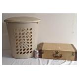 Vintage suitcase and plastic laundry basket