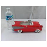 Ceramic planter shaped like a red 1957 Chevrolet