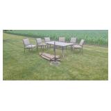 61.5x40x27 glass top patio table with 6 chairs