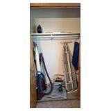 Contents including vacuum, ironing board,