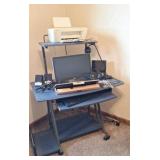 Computer desk,  monitor,  speakers, desk jet