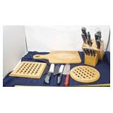 Knives, wood chopping board  and wood hot plates