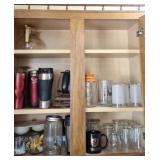 Contents of cabinet including, insulated cups,
