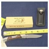 2.5" Buck knife with leather sheath advertising