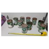 Metal Quaker state motor oil, 1 full, 9 empty