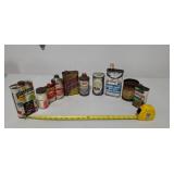 Collection of old metal oil, engine cleaner,