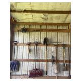 Shovels, hedge trimmers and everything on wall.
