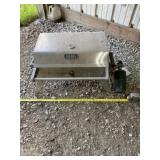 BHG grill with empty propane tank