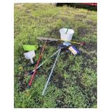 Brooms and wash bucket