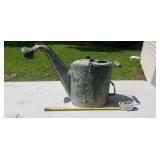 Vintage galvanized watering can