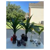 Candle holders and candles with glass vases