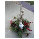 Christmas centerpiece in basket with tea light