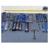 Collector spoons and key chain,  1 silver spoon