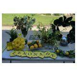 Lemon decor, vases of artificial flowers , yellow