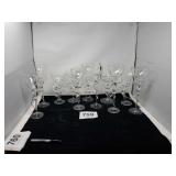 11) Nude Stemware, one with broken leg.