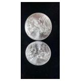 Two 2011 Silver Dollars.
