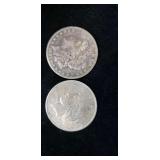 Two silver eagle dollars.