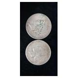 Two silver dollars.