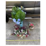 Basket and silk flower arrangements, glass