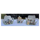 3 tea pots.
