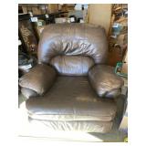 Leather reclining chair with some tears