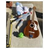 Sock monkey, cow stuffed animal, ball and kids