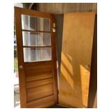 24 wide x 79 1/4 wood door with some broken