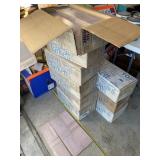 9 boxes of Masters Mauve flooring. Each box is