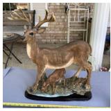 Buck and doe figurine with some glued on broken