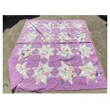 72 x 73 purple quilt with some tares