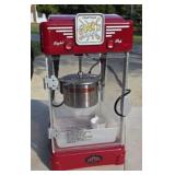 Fun time rocking popper tabletop popcorn machine.