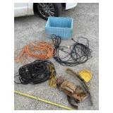 Extension cords, tool belt and blue plastic case