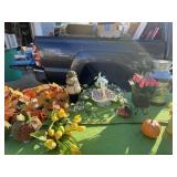 Artificial flower decor with pumpkins