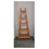 ornate wooden five-shelf etagere or bookshelf
