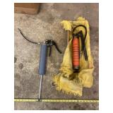 Two grease guns