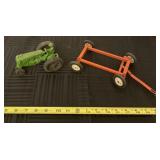 MM tractor and driver with a wagon frame.