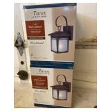 Two new sealed in box Patriot wall lanterns. One