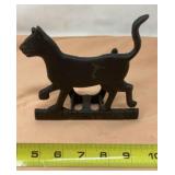 Cast iron cat boot scraper.