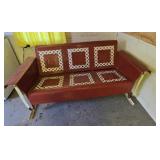 Metal outdoor sofa glider, featuring a