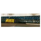 Two rolls of coned plastic fence.