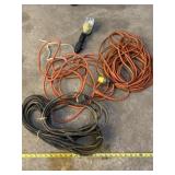 Two extension cords and work light with cord.