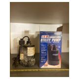 New 1/4 hp submersible utility pump in box and
