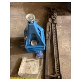 Four stacker jacks and a high lift Jack.