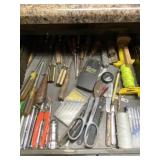 Air gauges, screwdrivers, string and cutters.