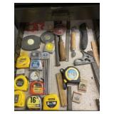 Tape measures, utility knife, marches and rulers.