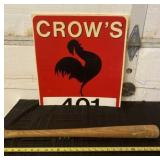 H & B Little League wooden bat and Crows sign.