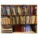 Three shelves of books including hymns, Chicken