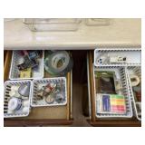 Contents of drawers including duct tape, labels