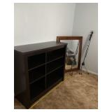 Wood open shelf cabinet measures 42 inches wide x